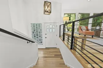 Large entry stairway -Updated Open Railing Extends the Living Space