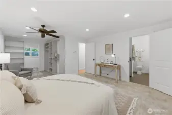 Primary bedroom with ensuite and a slider out to the hot tub.