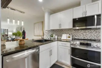 Kitchen opens up to the living room