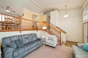 Living area open to dining and kitchen