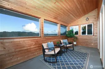 Main floor screened balcony/sunroom