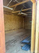 Inside the wood shed next to the apartment entrance