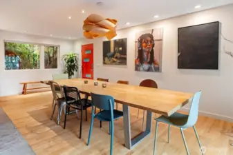 Perfect for those blustery PNW days, the huge dining room is separated from the living room by a fetching double-sided fireplace.