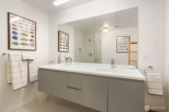 The ¾ bathroom on the lower level is yet another example of the thoughtful design that fills this stylish home.