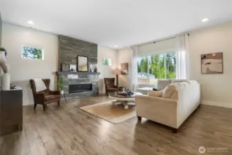 Upgraded marble floor to ceiling around gas (propane) fireplace