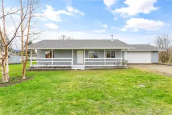 Country living charmer on .5+ acre with gardens, fruit trees & more waiting for new owners