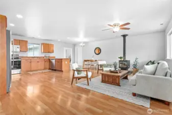 Welcoming entry opens into spacious living room & large open eat-in kitchen.