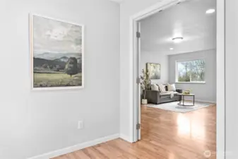 Mud hall/walk-way between main area of home & family room and rest in back