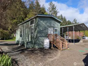 back side with large propane tank (they do deliver propane)