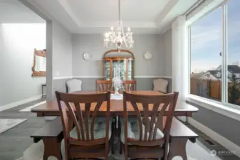 Enjoy meals with guests in this elegant dining room.