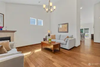 Front door into the living room...Vaulted ceilings. Hall takes you into the kitchen and dining room and bedrooms in the back of the home.