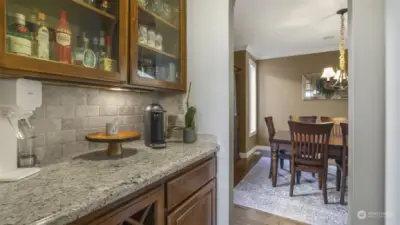 Tiled countertops and a direct sightline to the dining area for effortless hosting.