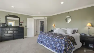 Thoughtfully designed master suite featuring a built-in cabinet and access to the walk-in closet.