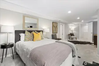 Bright and surprisingly spacious, this downstairs bedroom easily accommodates a full furniture setup with room to spare.