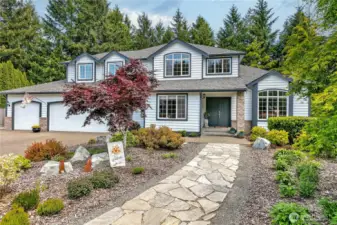 This home features 4 bedrooms, 2.75 baths, and 2,402 sq. ft. of beautifully designed living space.