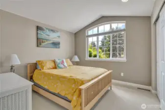 Additional bedroom with vaulted ceilings.
