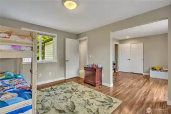 Adjoining the additional bedroom is a bonus room.