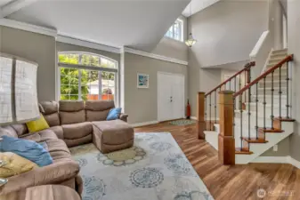 Relax or entertain in the formal living room with a large designer window that lets in the natural light.