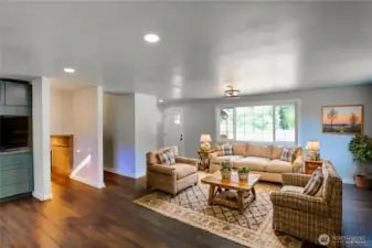 Virtually staged. Island was removed by the virtual staging.