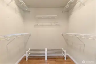 The walk-in closet off of the primary bedroom.