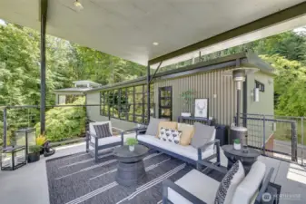 Another view of deck. This deck has stairway down to lawn also.