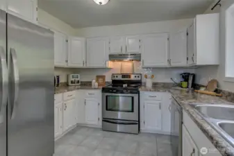 Kitchen area. Lots of cupboards and space.  Ready for you!