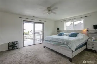 Main bedroom is very large with double open closets. Nice view and inviting balcony for morning coffee.