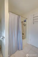 Shower/tub in upstairs bathroom.
