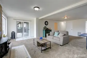 Downstairs rec room area has tons of space for games or movie night. Multipurpose room  or great for multigenerational living.