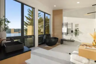 Spa-inspired bath – Freestanding tub, designer finishes, and endless views.
