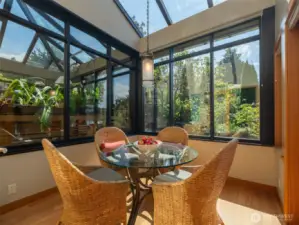 Imagine morning coffee in this light soaked sun room with direct access to the herb garden and terraces. Electric awning puts you in control