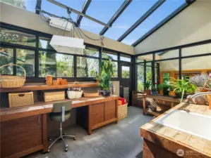 Sunlight and storage combine in the greenhouse - perfect for plants, hobbies or a quiet retreat. Climate controlled with humidifier.