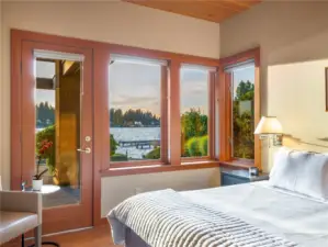 Wake up to sweeping views from the main floor ensuite bedroom