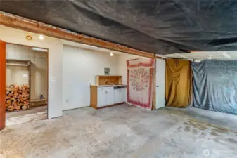Unfinished studio/workshop space is perfect for your projects and finishing touches.