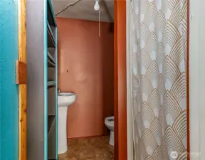 3/4 bath in unfinished workshop space.