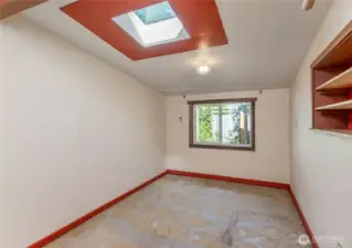 Bonus room located off workshop space.