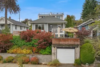 Perched on the high side of the street lends privacy and territorial views. Don't miss the 1 car garage!