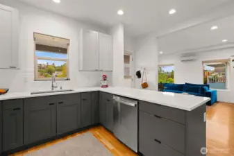 Kitchen opens to dining and living rooms