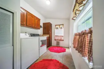 Large utility room with utility sink.