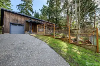 An inviting driveway finished with freshly laid gravel.