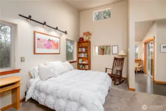 A spacious and calming retreat designed for rest and privacy, featuring warm natural light, thoughtful architectural details, and a seamless connection to the home’s outdoor living spaces.