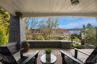 Covered front porch to take in the neighborhood.