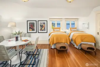 Third level has two additional bedrooms and full bath.