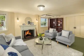 Cozy lower level family/media room plus full bath on this level