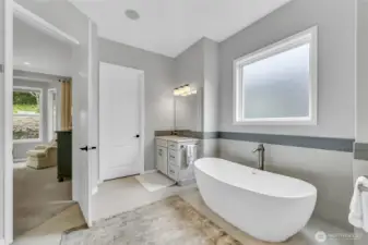 New flooring tile, Kohler undermount sinks, Hans Grohe faucets and a Toto toilet added in 2022.