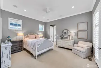 Guest retreat with French doors that open to the courtyard, plantation shutters and an-ensuite bath.