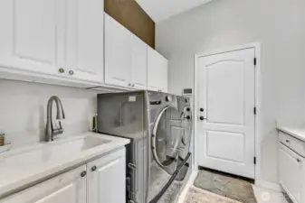 Quartz counters and a Blanco undermount composite sink added in 2024.