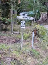 Cross street sign on left. Good turn around, then property is on the right.