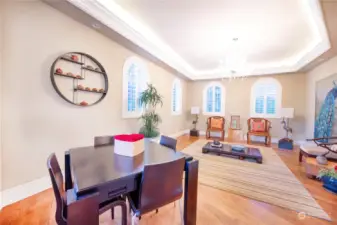 A large bonus room on the main floor serves as a tea room, office, or playroom