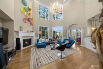 Beautiful soaring 20-foot ceilings in the grand living area with a newer Swarovski Crystal Chandelier